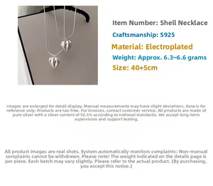 Detail of S925 sterling silver nut pendant necklace with matte vintage texture and thin chain