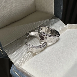 Elegant S925 sterling silver hoop earrings with hammered texture and pavé zircon stones