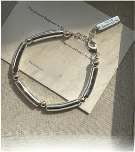 S925 silver minimalist bracelet featuring a rectangular tag with Future Expectation text