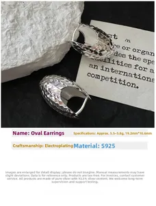 Detailed view of S925 sterling silver oval hoop earrings with diamond-cut texture and dimensions