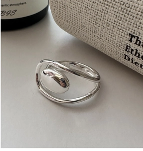 Macro shot of S925 sterling silver ring showing the inner S925 hallmark and polished surface