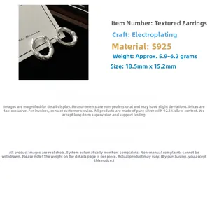 Detail of S925 sterling silver earring with irregular matte wavy texture finish