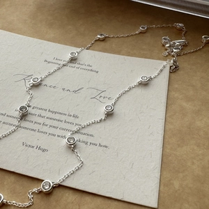 Minimalist S925 silver necklace with equidistant round-cut zircon stones on fine chain