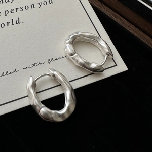 Minimalist S925 sterling silver hoop earrings with organic lava texture in matte finish