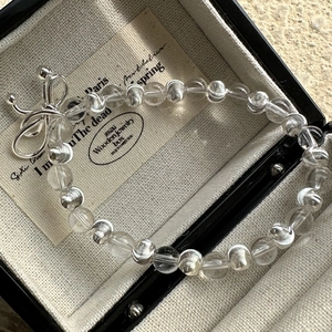 Bracelet élégant en argent S925 avec cristal blanc et nœud métallique en boîte à bijoux