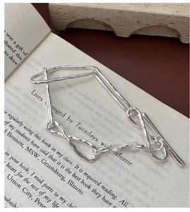 Close-up of S925 sterling silver hammered texture bracelet with elegant toggle clasp
