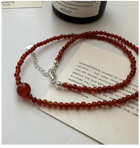 Detail of red agate beaded necklace with S925 sterling silver lobster clasp and extender
