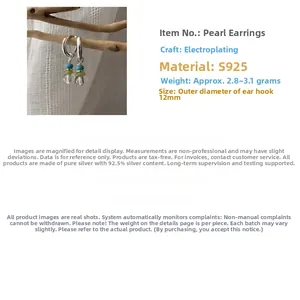 Close-up of S925 sterling silver hoop earrings with blue and green crystal beads
