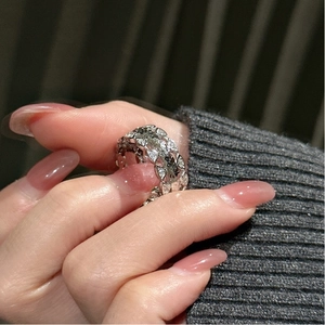 Close-up of s925 silver ring with marquise hollow design and sparkling zircon pavé