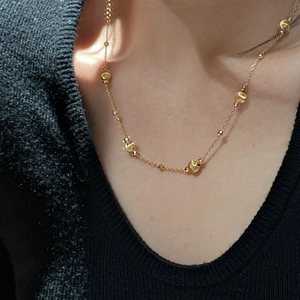 Minimalist S925 silver necklace with golden cat eye beads and spiral texture charms