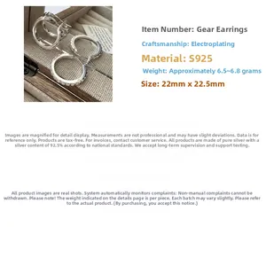 Macro shot of S925 silver gear earrings showing dimensions 22mm x 22.5mm and weight details