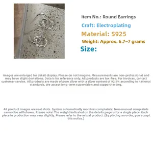 Detailed macro view of S925 sterling silver hoop earrings with a twisted knot texture