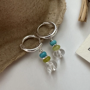 S925 Sterling silver beaded earrings with blue and green crystals on a neutral base