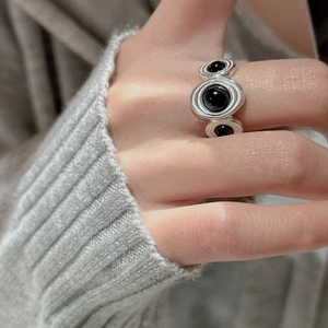 S925 sterling silver ring with three black agate beads in a cosmic orbital design