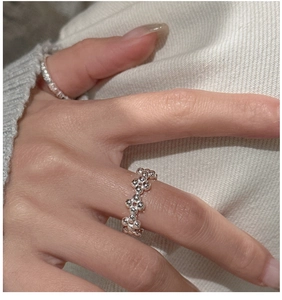 Detailed close-up of S925 sterling silver beaded ring on model finger showing 3D texture