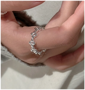 Close-up of minimalist S925 sterling silver beaded bubble ring on finger