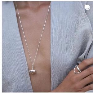 Minimalist S925 sterling silver necklace with spinning top pendant and geometric ring
