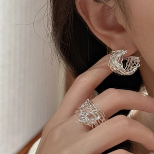 Minimalist S925 sterling silver hollow earring and ring set with lava texture design