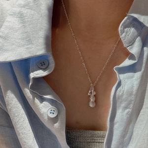 Minimalist S925 sterling silver gourd pendant necklace worn on neck for a chic look