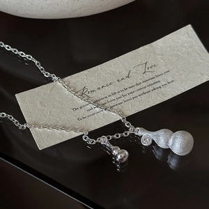 925 sterling silver frosted gourd pendant necklace with zircon on a black mirror background