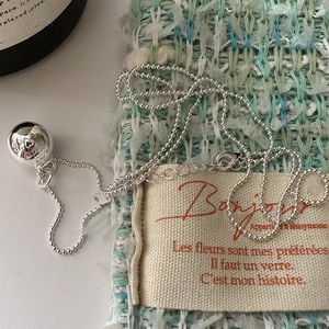 Polished S925 sterling silver bead chain necklace featuring an engraved heart pendant