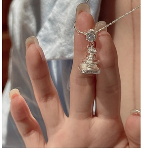 Close-up of S925 silver layered fountain pendant necklace with white zircon stone