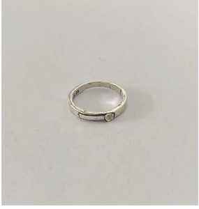 Macro view of S925 sterling silver ring showing the inner S925 hallmark and texture
