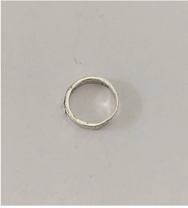 Close-up of S925 sterling silver hallmark and handcrafted vintage texture on minimalist ring