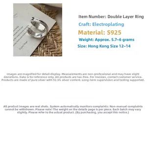 Close-up of S925 sterling silver stamp on the inner band of the double layered ring