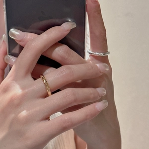 Minimalist S925 sterling silver high polished round band ring worn by model