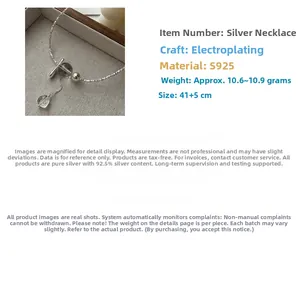 Detailed macro view of S925 sterling silver crushed beads necklace with T-bar toggle clasp
