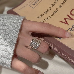 S925 sterling silver wide band ring with irregular wave layers worn on finger