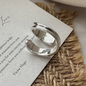 Minimalist S925 sterling silver crossover open ring on vintage poetry paper