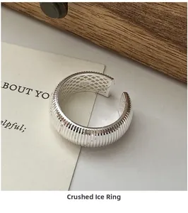 Macro detail of S925 sterling silver ring showing crushed ice texture and S925 hallmark