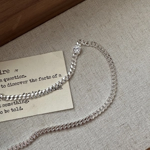 Vintage S925 sterling silver necklace with single cubic zirconia on a tank chain style