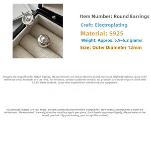 Detail view of S925 silver hoop earrings with white pearl and 12mm diameter measurement