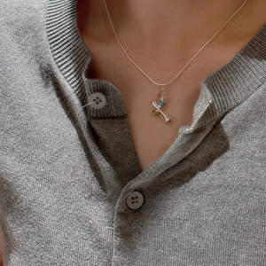 S925 sterling silver stacked necklace featuring raw stone and blue bead pendant