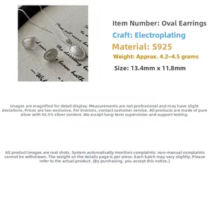 Detail of S925 sterling silver oval earrings with brushed texture and 13.4mm dimensions