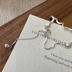 Minimalist S925 sterling silver moon link necklace with adjustable box chain on white paper