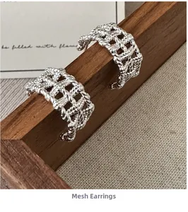Close-up of S925 sterling silver mesh earrings with intricate woven grid design