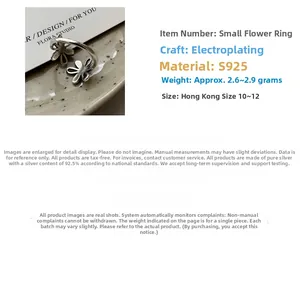 Macro view of S925 sterling silver dual flower open ring with detailed specifications