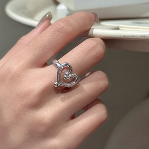 S925 sterling silver minimalist heart ring with delicate hollow design and bead accent