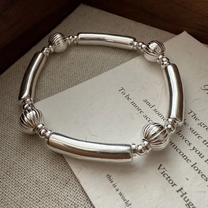 S925 sterling silver beaded bracelet with polished tubes and striped watermelon beads