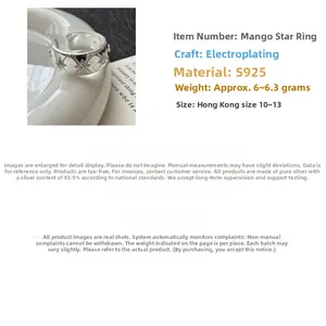 Macro detail of S925 sterling silver star ring featuring an eight-pointed star design