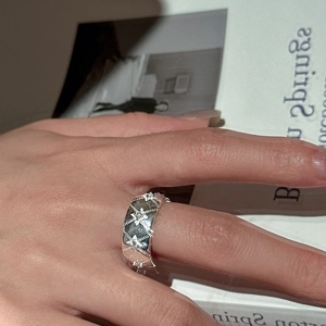 S925 sterling silver four-pointed star ring with rhombic texture and cubic zirconia accents