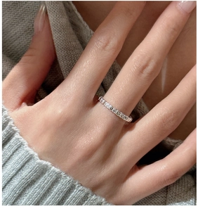 Detailed view of S925 sterling silver ring with vintage texture and heart engravings