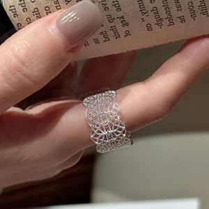 Elegant S925 sterling silver ring with intricate lace texture and openwork design