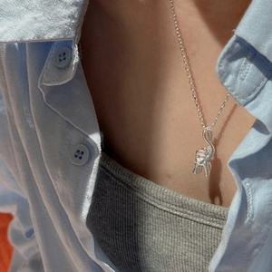 Minimalist S925 sterling silver necklace featuring a realistic 3D elephant pendant on model
