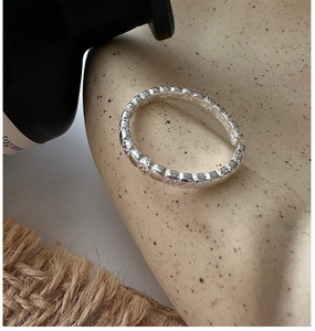 Close-up of S925 sterling silver ring featuring a vintage textured surface and open design