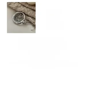 Detail view of S925 sterling silver ring featuring three minimalist beads and electroplating